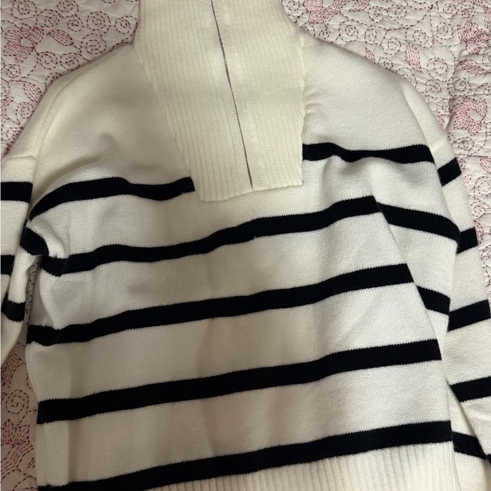 Elegant Black and White Striped Turtleneck Sweater